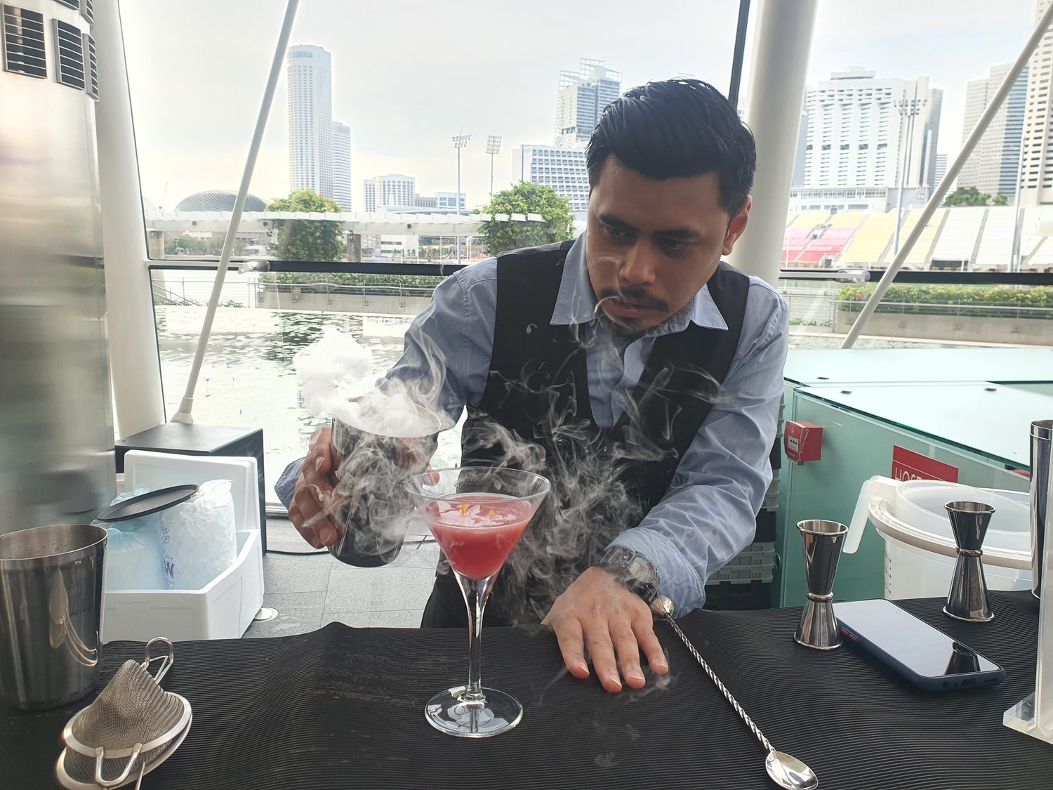 Mixologist crafting a cocktail